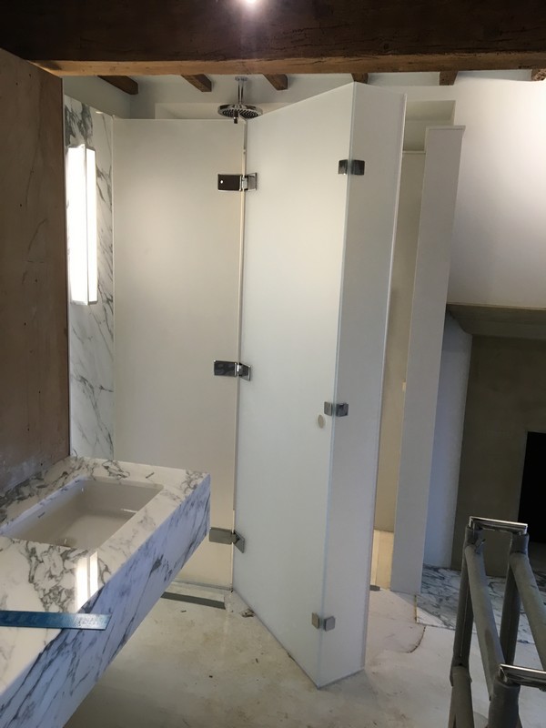 Bespoke frosted glass shower enclosure in Whitechapel luxury bathroom
