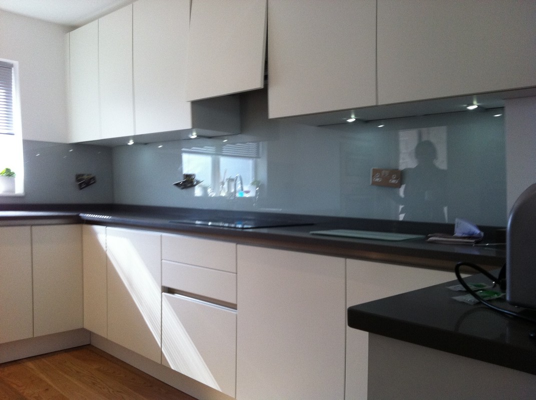 Grey glass kitchen splashback with LED lighting in Whitechapel
