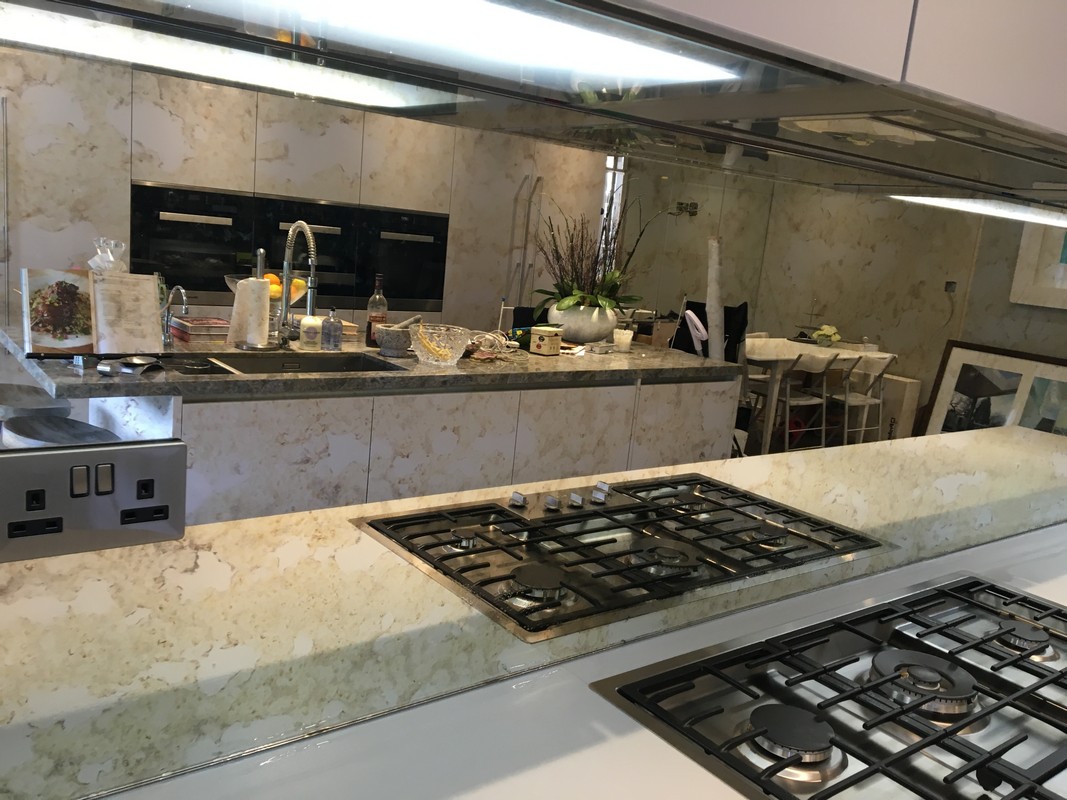 Mirror glass splashback in Whitechapel luxury kitchen